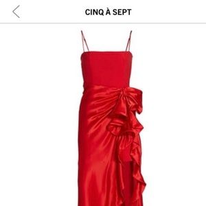 Stunning red silk dress. Worn once for a wedding . It has removable cups . New